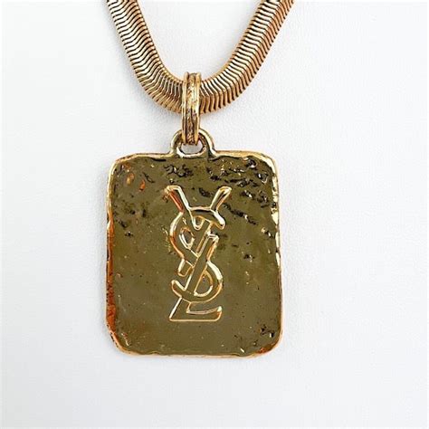 ysl puzzle pendant|YSL vintage necklace.